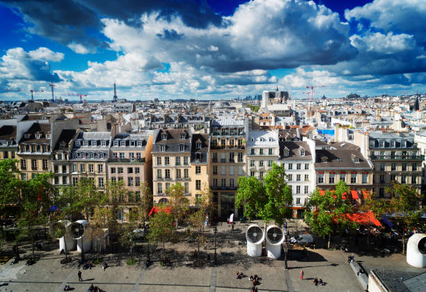 Square of Georges Pompidou and cityscape of Paris France, retro toned