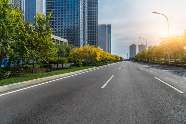 istock city road through modern buildings in beijing 876481174