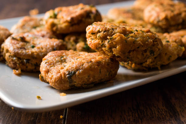 istock Fried Chickpeas Falafel on wooden surface. 876481364