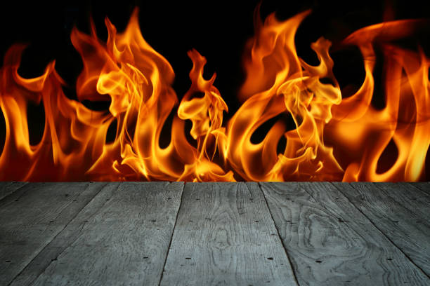 istock old perspective wooden floor with blaze fire flame 876481726