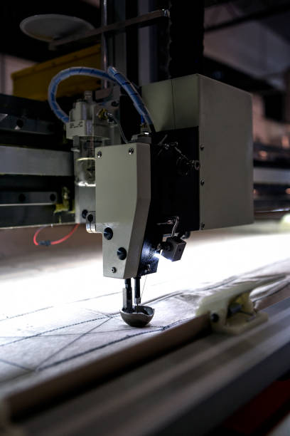 istock Automated industrial Sewing machine close up 876484740