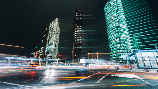 istock Potsdamer Platz with abstract light trails at night, Berlin, Germany 876485152