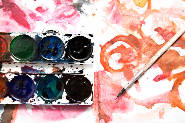istock painting watercolor paint on white paper 876485348