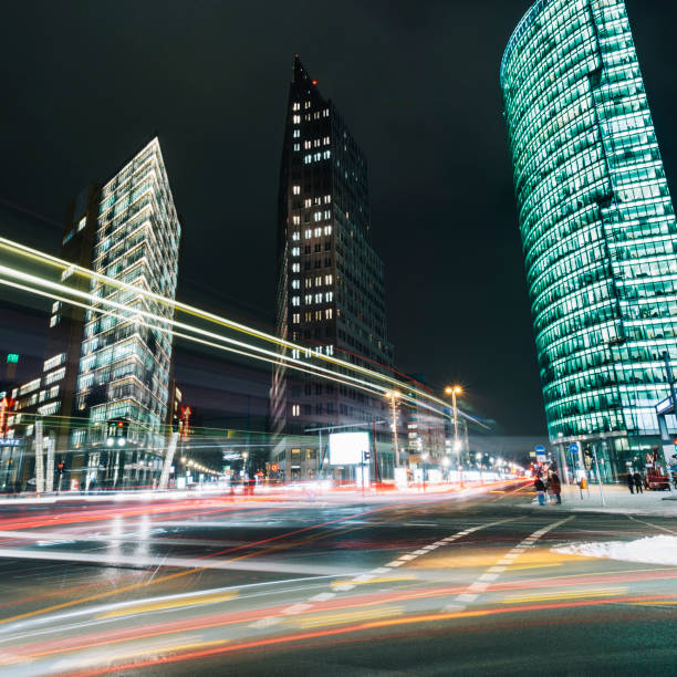istock Potsdamer Platz with abstract light trails at night, Berlin, Germany 876485364