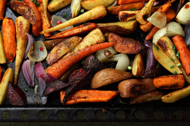 istock Baked vegetables top view, food 876485668