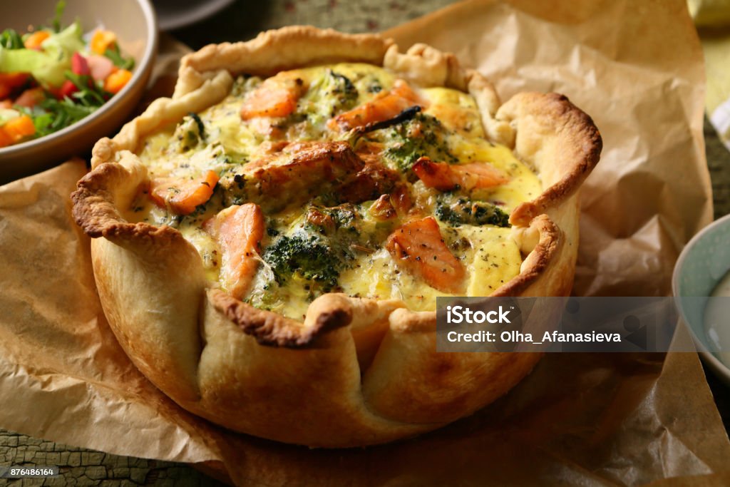 Tasty quiche pie with fish and vegetables, food closeup Baked Stock Photo