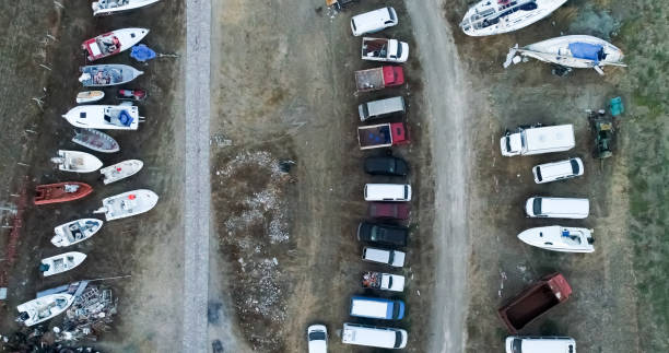istock Car and Boat Cemetery 876487428