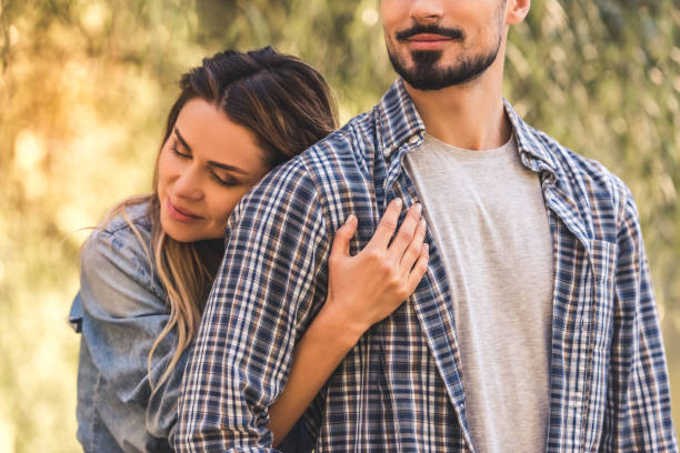 istock Couple resting in park 876492758