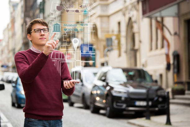 istock Augmented reality in marketing. Man with phone. 876493486