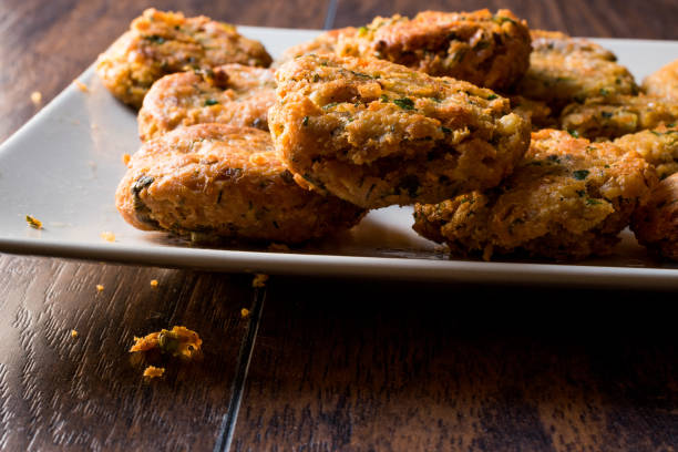 istock Fried Chickpeas Falafel on wooden surface. 876493592