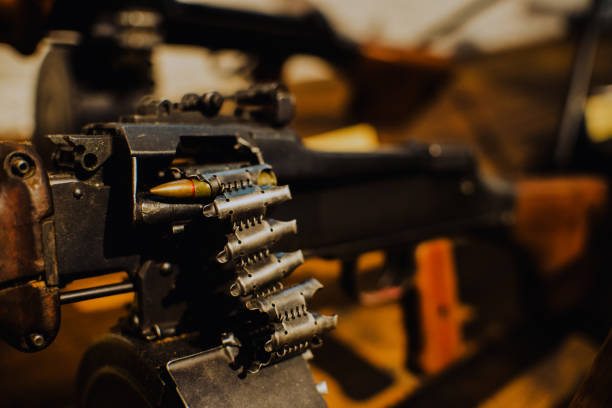 istock close up on last bullet in the machine gun 876508346