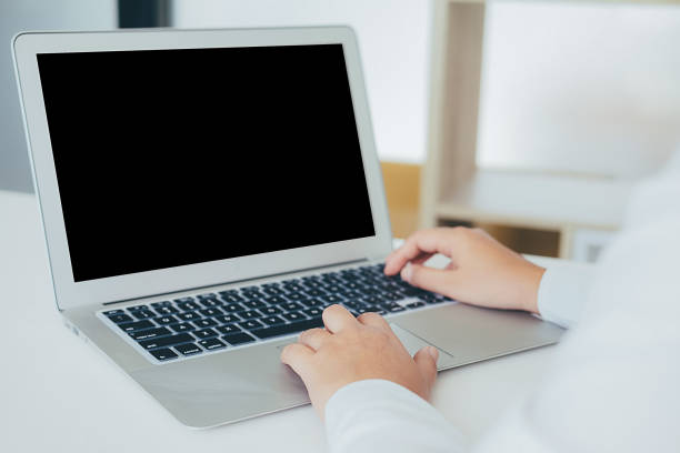 istock female hands typing on the notebook keyboard.Concept of young people work mobile devices. 876509188