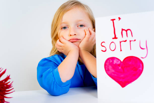istock Girl with valentine postcard 876521818