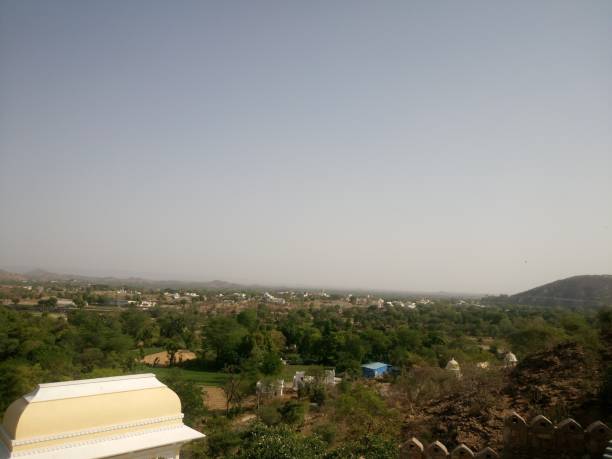 istock Scenic view of mountains against sky 876522652