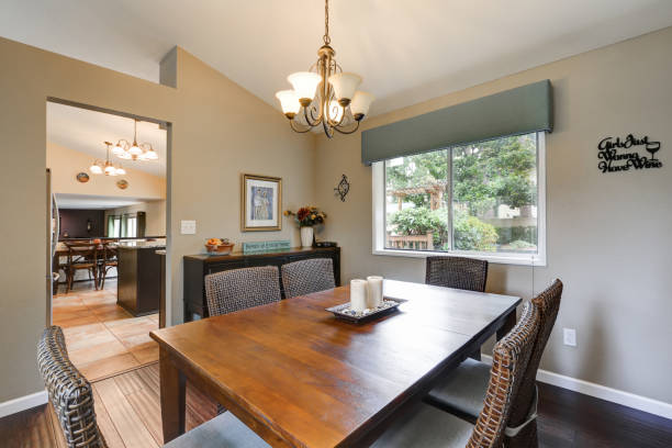 istock Elegant dining room accented with wicker chairs 876526614