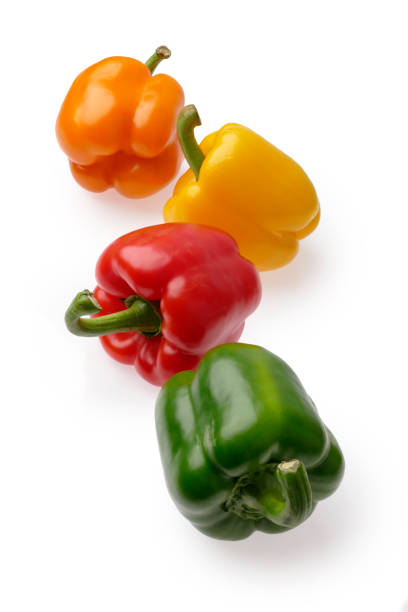 istock Colorful sweet peppers isolated on white background 876531972