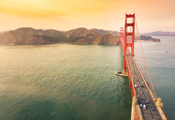 istock Golden Gate bridge aerial view at sunset 876538278