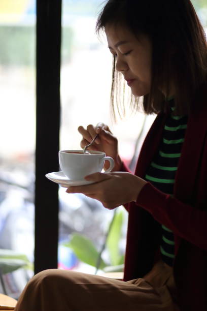 istock The woman using a smartphone in cafe 876542830