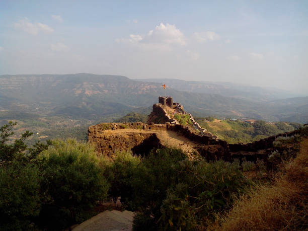 Pratapgad Fort On Mountain Pratapgad Fort On Mountain Against Sky maharashtra stock pictures, royalty-free photos & images