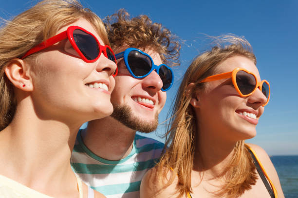 istock Group friends boy two girls having fun outdoor 876551130