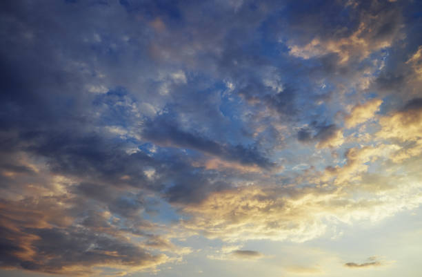 istock Beautiful sunrise or sunset sky with colorful clouds wallpaper 876554582