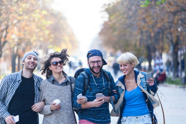istock Friends holding hands and hanging out 876554588