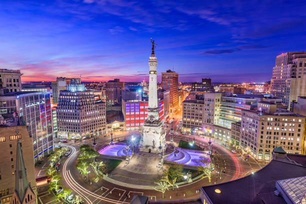 Indianapolis, Indiana, USA Indianapolis, Indiana, USA skyline over Monument Circle. traffic circle photos stock pictures, royalty-free photos & images