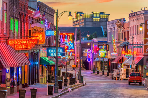 Beale Street Memphis Tennessee Memphis: Blues Clubs on historic Beale Street at twilight. memphis tennessee stock pictures, royalty-free photos & images