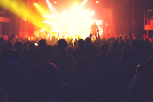 istock The audience watching the concert on stage. 876563904