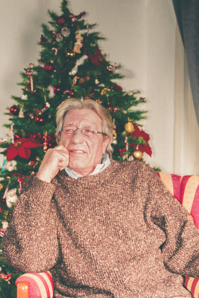 istock christmas tree and grandfather 876564048