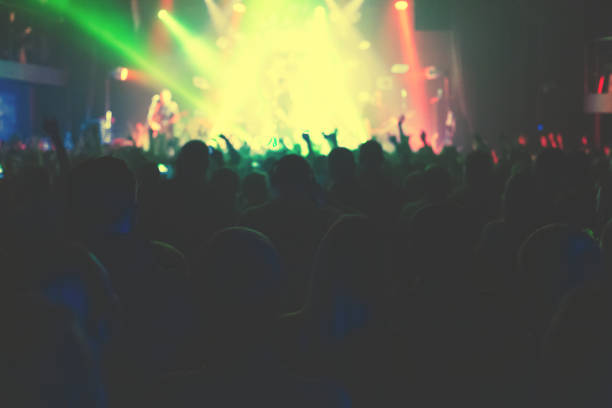istock The audience watching the concert on stage. 876564146