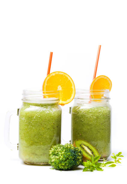 istock Kiwi and broccoli smoothie in a jar isolated 876564394
