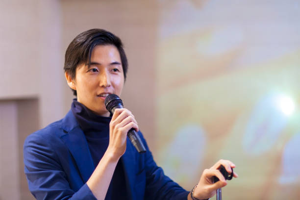 Asian Businessman Giving Presentation