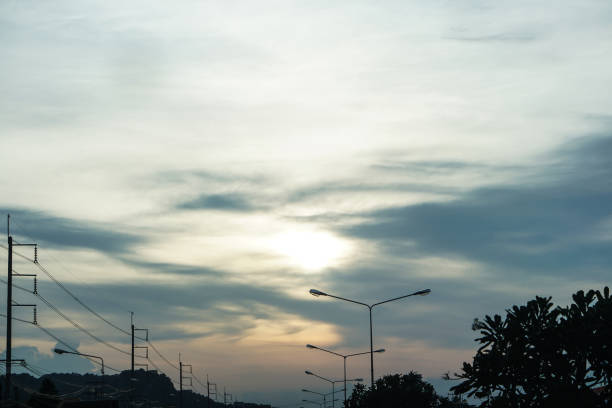 istock evening blue orange sky sunset on the road 876570232