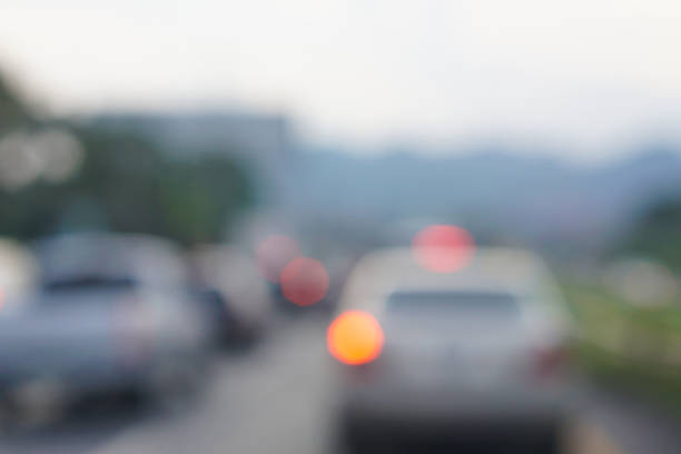 istock blur evening city road light bokeh background 876572240