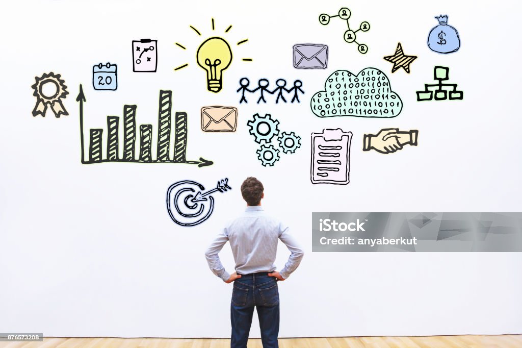 business concept sketch businessman looking at hand drawn business concept sketch Sale Stock Photo