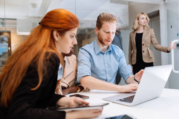 istock Group of business people working in office 876573306