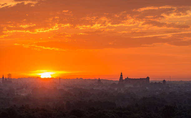 istock Krakow, Poland, Wawel castle silhouette at sunrise 876577120