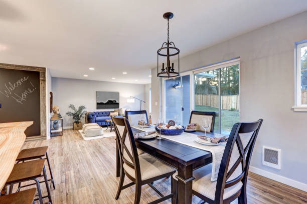 istock Open plan dining room interior with light wood floors 876583296