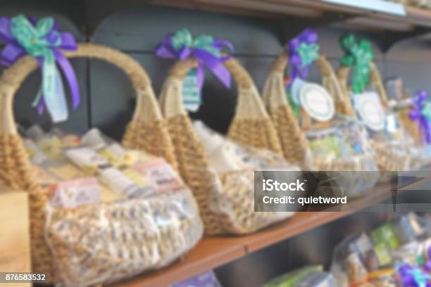 Blur Photo Of Wicker Basket Full With Gift Pack Ready For Sale At Shelf Stock Photo - Download Image Now