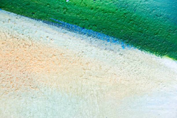 istock Abstract color painting on concrete block background (green,blue,white) 876587084