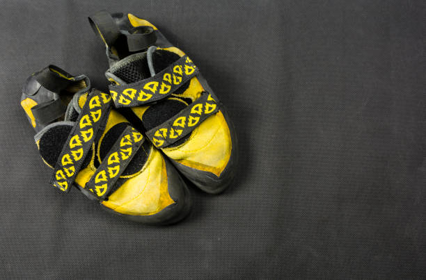 Yellow climbing shoes.