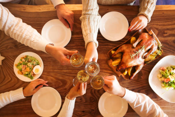 istock Christmas dinner with roast duck and champagne 876590570