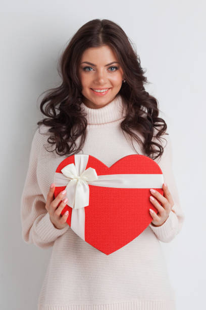 istock Girl with heart-shaped box 876596848
