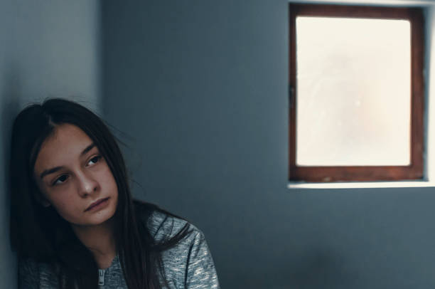 istock Sad Depression - Sad, lonely woman. 876597532