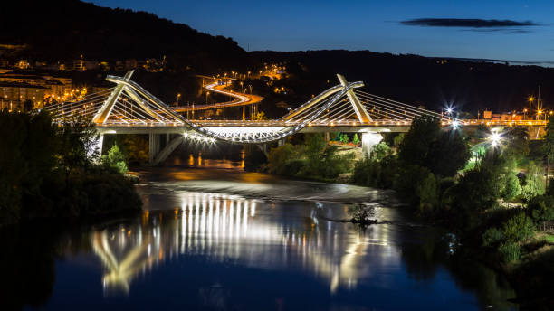 istock modern bridge over river in galicia 876597946