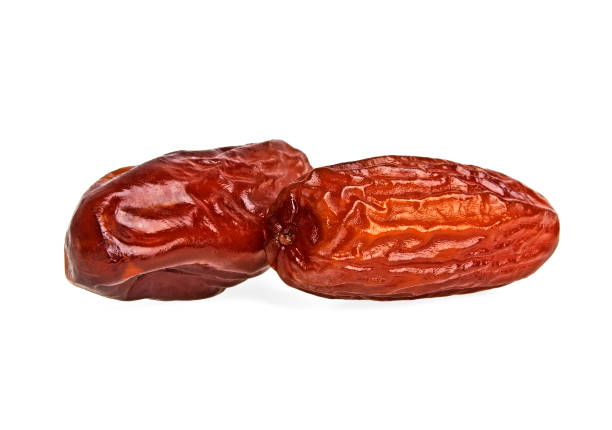 istock Dried dates fruits isolated on white background 876601822