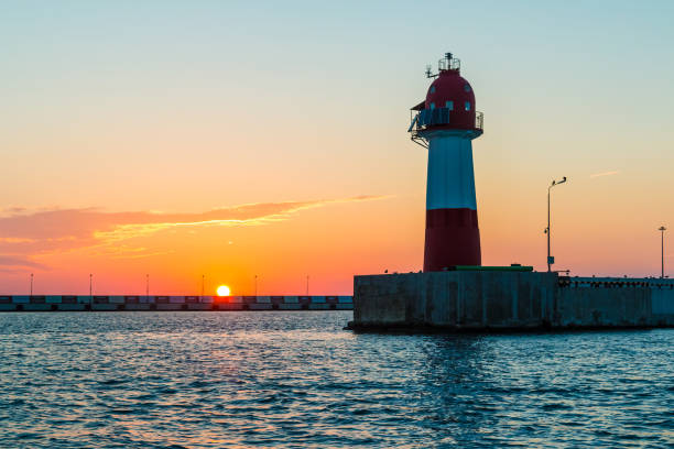 istock Sunset over Northern mole, Sochi, Russia 876608412