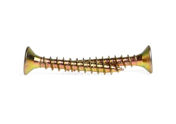 istock Golden screws on white background 876608588