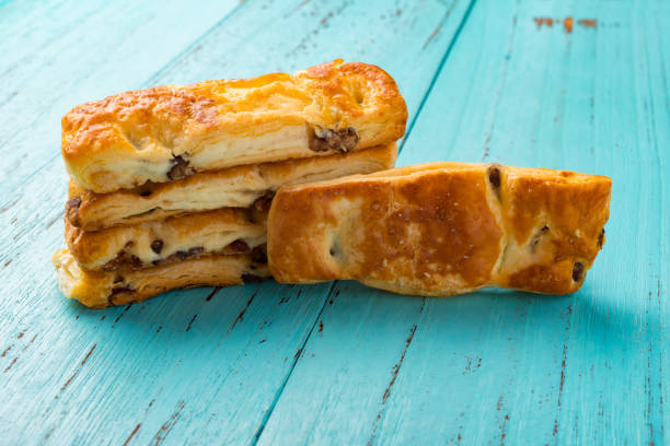 istock sweet red bean pastry stacked up on wood background 876611410